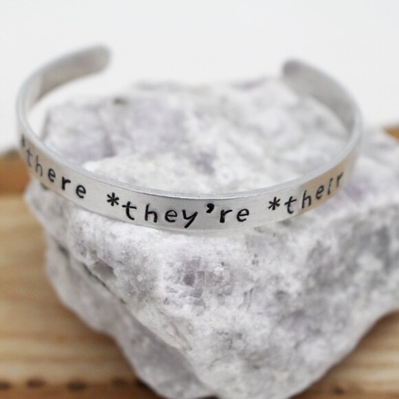 *There *They're *Their - Hand Stamped Anodized Aluminum Bangle - Adjustable - Picture 2 of 14